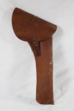 One brown leather flapped right handed revolver holster for 1800's style western pistol. Black