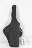 One black nylon Bianchi right handed paddle holster. Like new for compact auto.