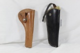 Two leather right handed holsters. One elk hide lined black for 6 1/2