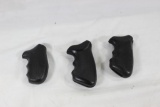 Three rubber revolver grips. Like new.