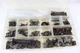 One plastic flat storage box full of miscellaneous gun parts. Used.