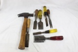 One 16 oz claw hammer and six different chisel's. Used.