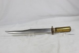 One steel file Bowie style knife with a 50 cal brass rifle case. Made by Pearce. 6