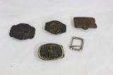 Bag of four brass buckles and silver colored. Used.