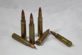 .223 / 5.56 ammo. Box with +/-50 rounds of loose .223 / 5.56 ammo.