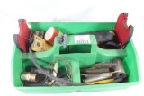 Plastic box with misc gun cleaning items, brushes and various gun parts.