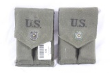 Two U.S. Mag pouches. Canvas. Each has 2 1911 .45 ACP mags in them.