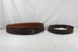 Two leather gun belts. One very wide belt for approx 36