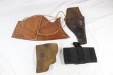 Holsters and other leather items, including leather cheek pad for rifle stock, very old holster for