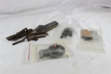 Small gun parts, some antique, as pictured