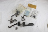 Baggy of small misc gun parts, some antique. Many swivel parts.