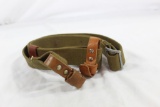 One canvas rifle sling. Used.
