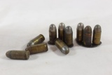 .45 ACP ammo. Baggy with 30+/- rounds of old, antique .45 ACP ammo. With some half moon clips &