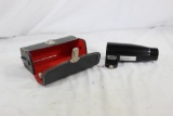 Bushnell bore sighter, in leather, red felt lined case. In very good condition.