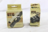 Two UTG Tri-rail barrel mounts. One just a 3 rail mount and one 3 rail and flashlight holder. New in