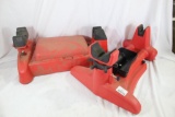 Two Red plastic rifle cleaning stations. Used in good condition.