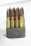 Ammo belt. Military ammo belt with 9 loaded M1 Garand clips (72 rounds) and 1 empty pouch, of