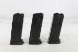 Three Taurus Pt 145, Ten round 45 ACP magazines. Used.