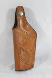 One Bianchi Brown leather thumbsnap right handed holster for 9mm/45 ACP. New in package.