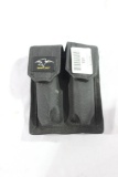 One Galati double magazine pouch with two Sig Sauer 13 round 9mm magazines in pouch. Like new.