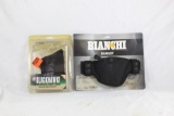 One Bianchi right handed with auto retention, new and one BlackHawk Ambi nylon ISP for small