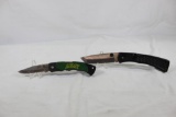 Two belt clip folding knives. Like new. China.