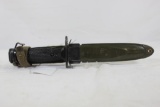 One M1A bayonet with metal scabbard. Used.