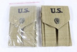 Two US double canvas 45 ACP magazine pouches. New, manufacture in 1942.