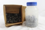 Box of 3 ring buffalo bullets 50 cal and a jar of 50 cal round balls for black powder shooting.