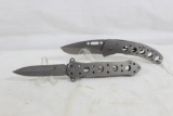 One FURY aluminum folding hunter. China and one assisted opening Tactical knife.
