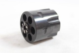 One Ruger blued fitted 9mm cylinder for Ruger BlackHawk 357 revolver. Like new in box.
