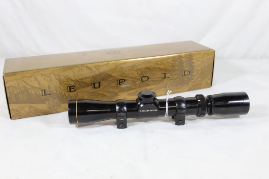 One Leupold VX I 2-7 x 20 rimfire rifle scope with Leupold rubber scope covers. New in box.
