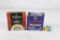 Five partial packs of mixed size primers and one can of Rigate Italian capsules.