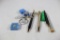 Misc items. Two Remington gun lock keys, four ball point pens, four other pins plus two other small