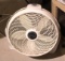 Large plastic table top/floor fan. Used.