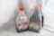 Two Johnson 2-cycle outboard oil, full and one partial Johnson 2 cycle oil.
