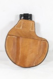One leather Pager Pal in waist holster with fake pager. Used in very good condition.