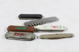 Six small Coca-Cola advertising knives.