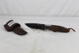 Boker Magnum sheath knife with 3.5 inch blade, micarta scales original leather sheath. Used in good