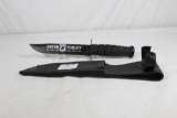 Ka-Bar model 1211 combat knife with 7.0 inch blade. Original leather sheath. Appears as new.