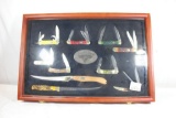 America's Legacy North American Fishing Club display set. Ten knives in display case. Glass has