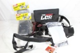 Box of miscellaneous gun items. Nylon Ruger LCR pistol case, one nylon shoulder holster,metc.