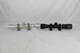 One silver Simmons 2-6 x 32, 4-Plex pistol scope with silver rail mount rings and one Bushnell 2-6 x