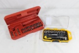 One red plastic partial screwdriver set and one partial socket/screwdriver set. Used.