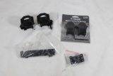 Two sets of rail mount scope rings. One B-Square new in package.