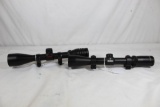 Two rifle scopes. One Burris 3-9 x40 4-Plex scope with rail mount rings. Like new and one Redfield
