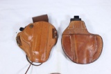Two brown leather holsters both are right handed. One in pant and one belt. In very nice condition.