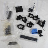 Bag of miscellaneous rails, scope rings, etc. In very good condition.
