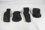 Bag of miscellaneous hard plastic holsters. In very good condition.