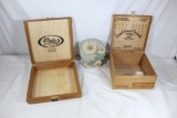 Two wood cigar boxes and one plaster cast desk decoration.